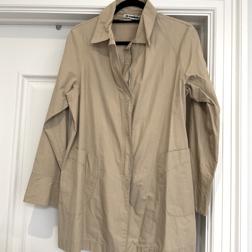 Jill sanders, rain/trench coat.
